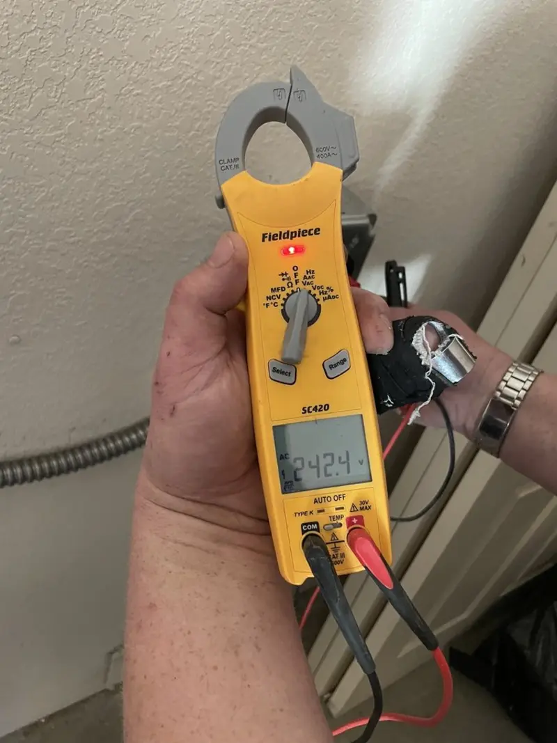 Voltage testing with clamp meter during Whole House Surge Protector in Broken Arrow